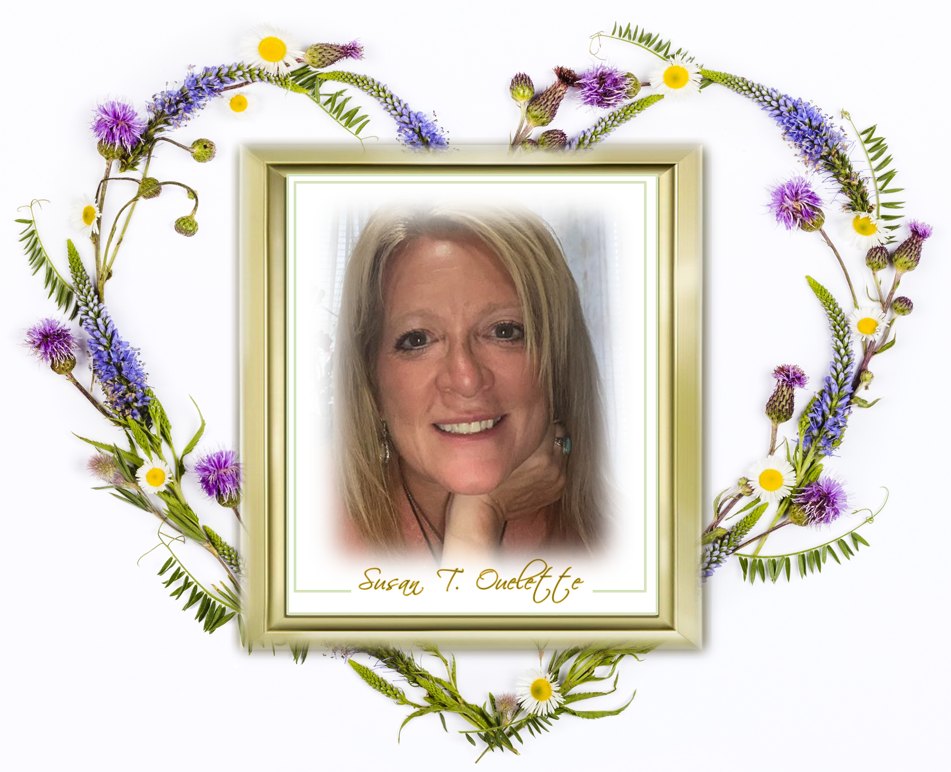 Susan T. Ouellette, framed in a heart of wildflowers